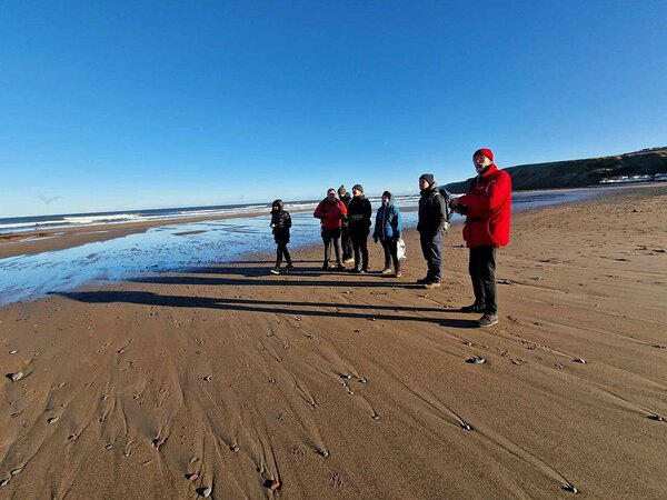 The excursion group admiring the amazing view and enjoying the sunny day at the Peasey Bay. Photo: Liina Sadam (EGT).