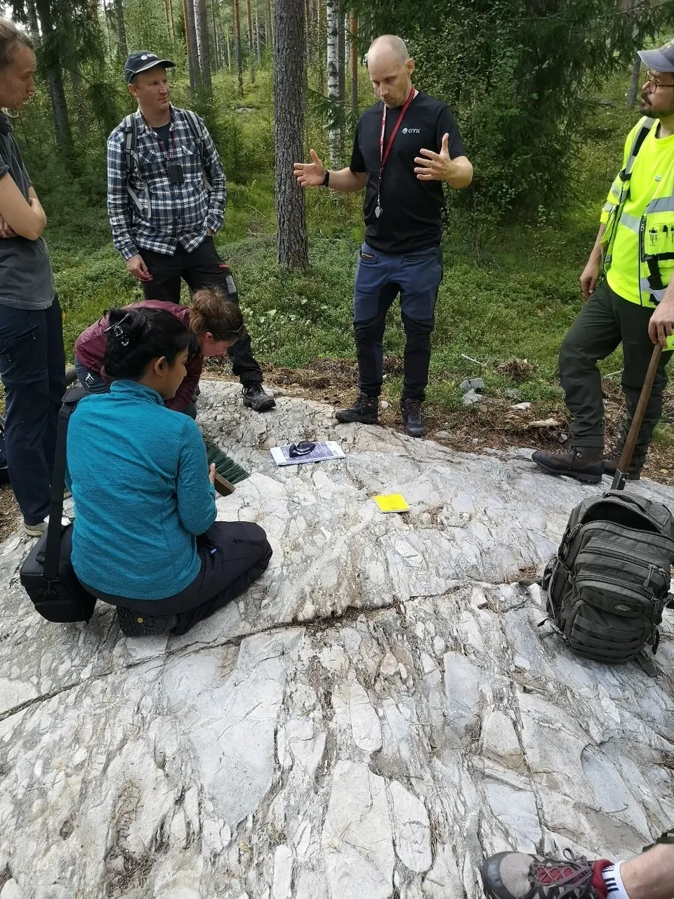 Group at the outcrop of very poorly, reverse to normal graded, clast to matrix-supported, monomict volcanic breccia.