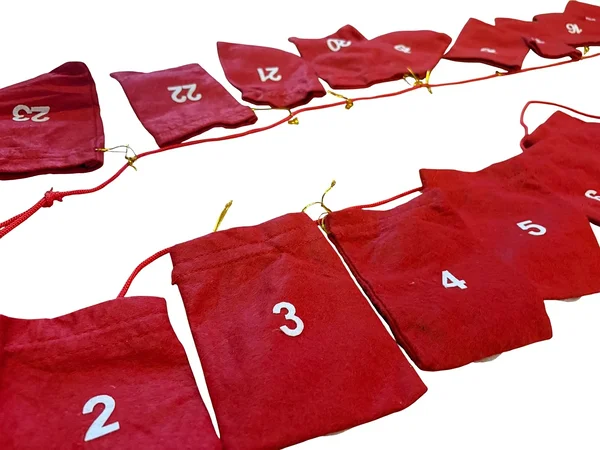 Taskutega kangast advendikalender seinale