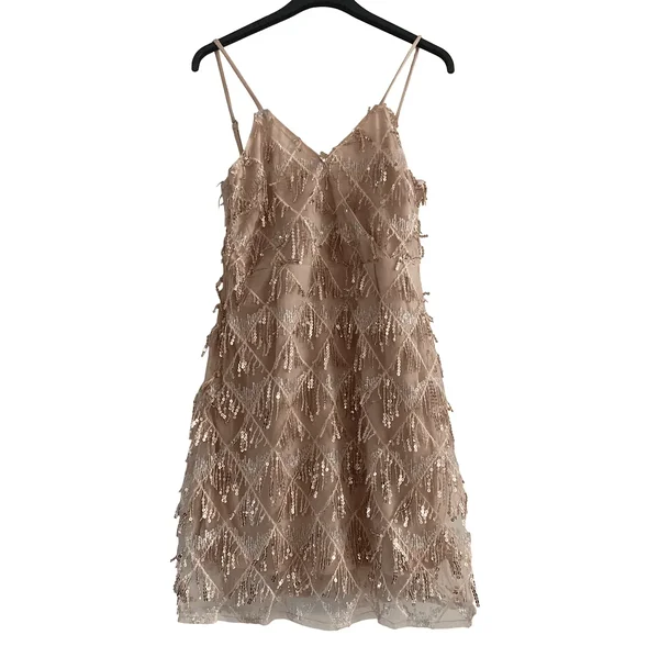 Light-toned dress with open neckline