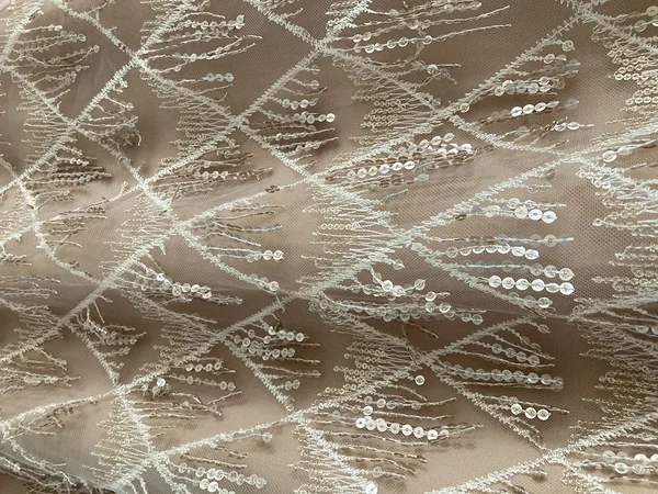 Light-toned sequin dress