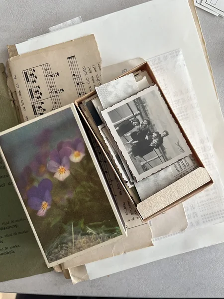 [vintage] vintage matchbox filled with ephemera