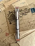 white-gray with red clip