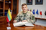 GEN Raimundas Vaikšnoras, Chief of Defence of the Republic of Lithuania, signing the BALTDEFCOL Guest Book