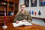 MG Kaspars Pudāns, Commander of Latvian National Armed Forces, signing the BALTDEFCOL Guest Book