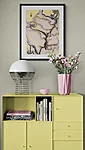 Colorful cabinet with lamp and flowers