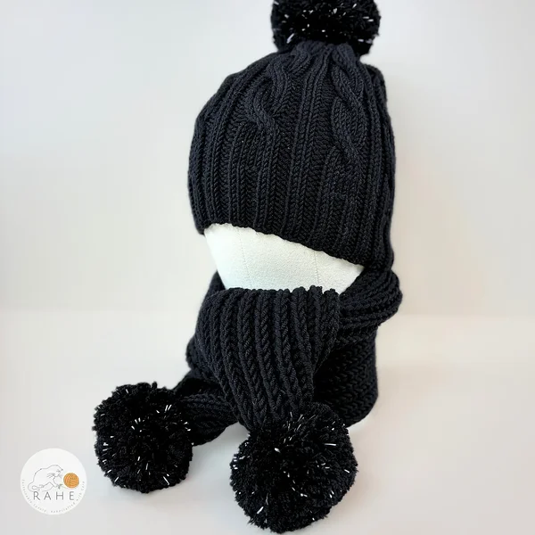Knitted scarf and hat sets with reflective pom poms. 