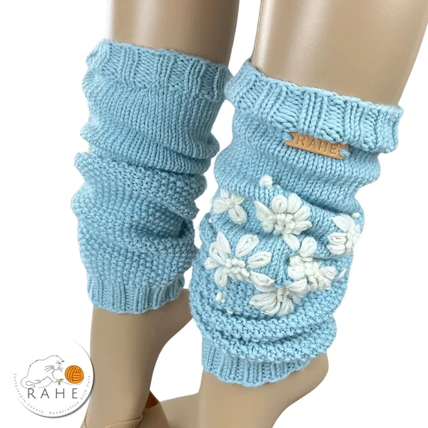 Light blue hand-knitted merino wool leg warmers for women and teens – hand-embroidered with white flowers, a luxurious Estonian handmade gift by RAHEcraft.