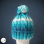 Cable knit gradient turquoise white vegan beanie reflective glow bobble rahecraft 1