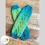 Green turquoise leg warmers crossed flatlay handmade wool blend rahecraft