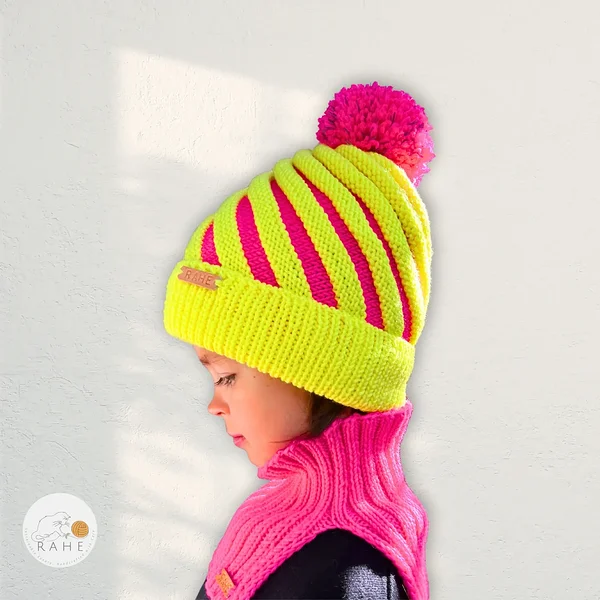 Hand-knitted merino wool neon yellow and pink bobble hat. Warm double brim reflective beanie. Handmade gift for kids and teens.