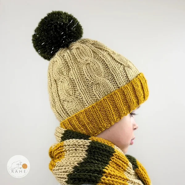 Kids knitted hat and scarf set in beige, mustard yellow, and dark green. A reflective winter beanie and striped long scarf with pom poms.