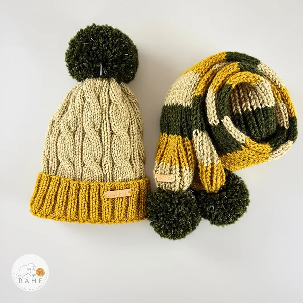 Beige, mustard yellow, and dark green bobble hat and striped scarf set for boys and girls.