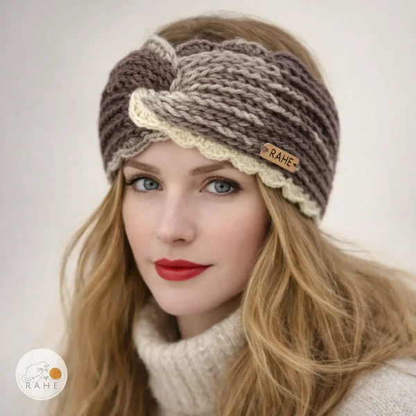 Woman wearing a hand-knitted wide acrylic headband with twisted front, brown and beige tones, crocheted scalloped lace edge, RAHEcraft