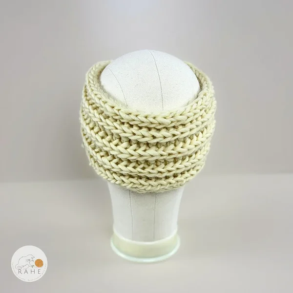 Back view of a hand-knitted ivory white chunky wool ear warmers for girls and women.