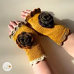 Hand knitted fingerless gloves flower lace edge women mustard yellow rahecraft worn
