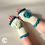 Hand knitted fingerless gloves flower lace edge women white teal rahecraft model front