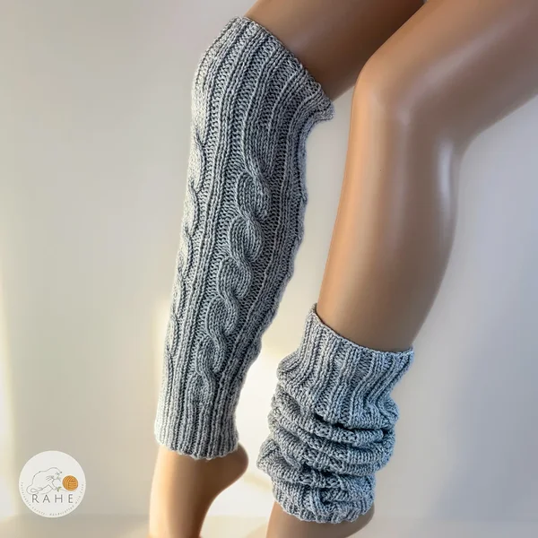 Two ways to wear RAHEcraft hand-knitted cable knit leg warmers: fitted or slouched. Soft grey knit design for cozy winter outfits. Available in Adult, Teen and Kid sizes.
