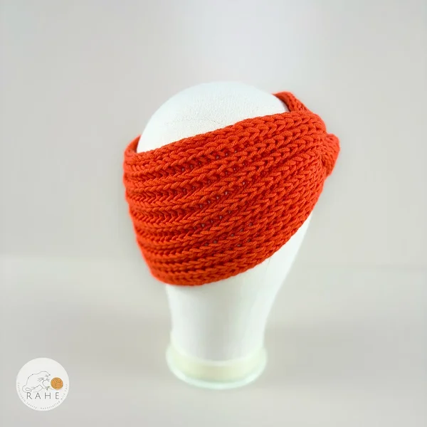 Hand-knitted merino wool headband in orange for girls and women. Twisted knitted ear warmer for kids and adults.
