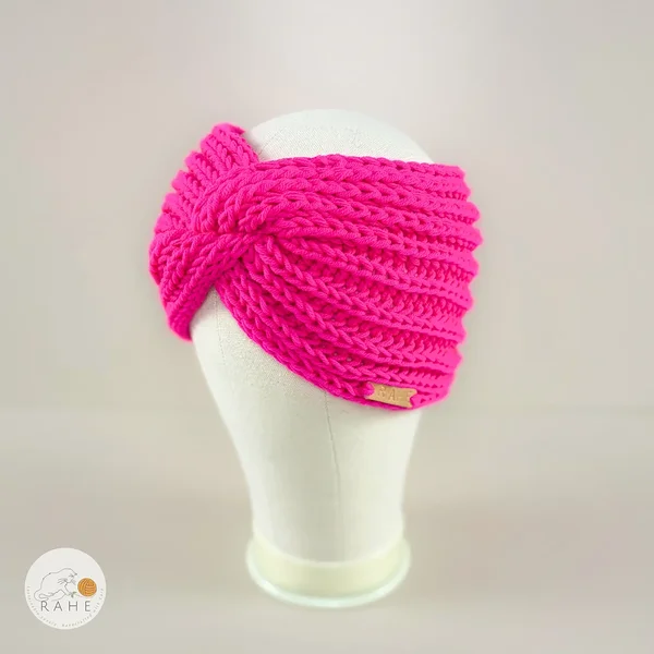 Hand-knitted neon pink merino wool headband for girls and women.