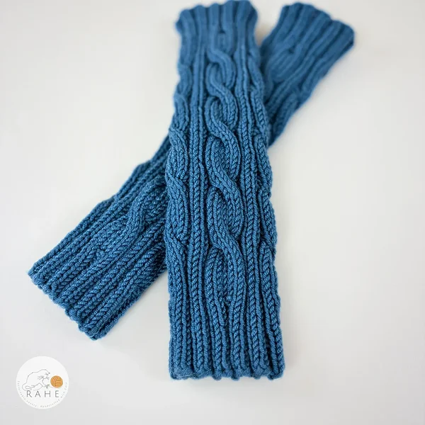 Blue hand-knitted merino wool leg warmers in cable knit. Kids blue leg warmers.