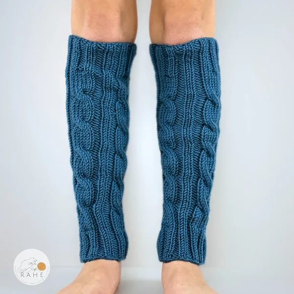 Sky blue leg warmers for girl and boy. Handmade knitwear in cable knit.