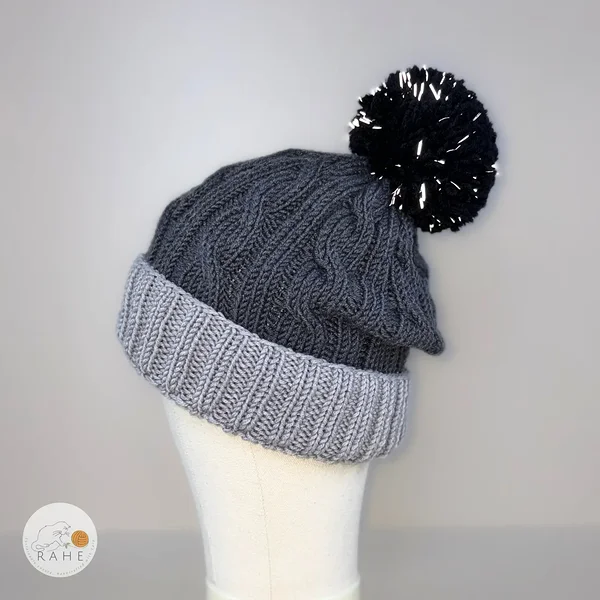 Hand-knitted merino wool reflective pom pom beanie. Gray wool winter hat for kids, teens, women, and men. Handmade in Estonia.