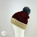 Hand knitted reflective pom pom hat kids teens burgundy grey beige rahecraft angled left