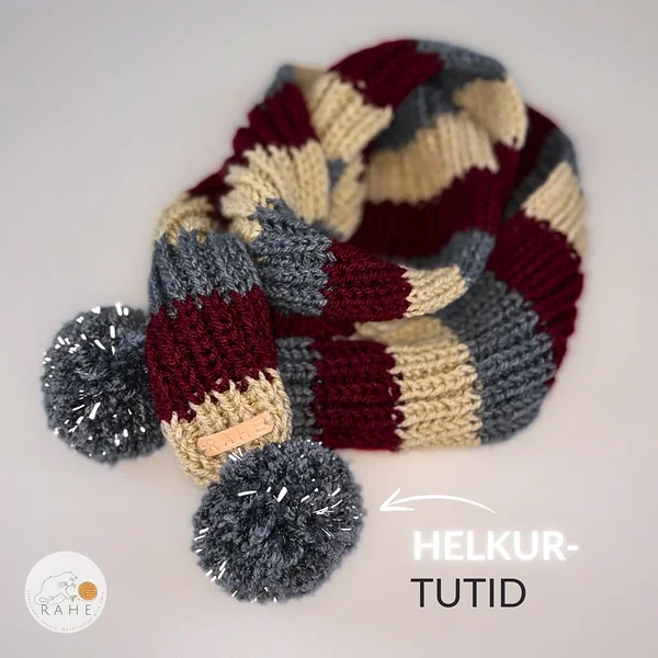 Pikk ja kitsas kootud sall lastele ja täiskasvanutele.