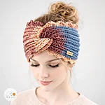 Hand knitted wide acrylic headband blue peach gradient lace edge rahecraft on model