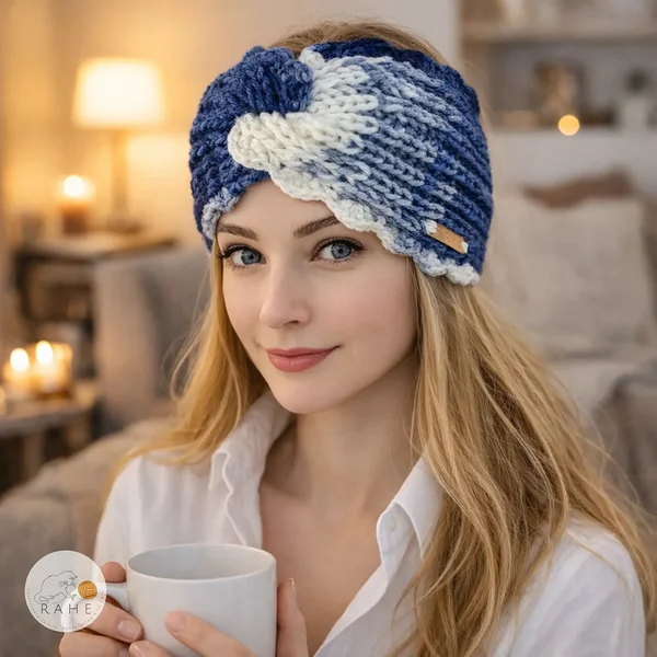 Hand-knitted wide headband worn by woman indoors, blue and white textured knit with scalloped edge, cozy lifestyle winter accessory, RAHEcraft