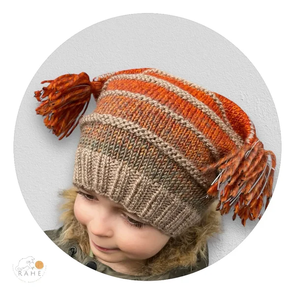 Hand-knitted wool blend hat with reflective tassels in gradient orange and beige | RAHEcraft