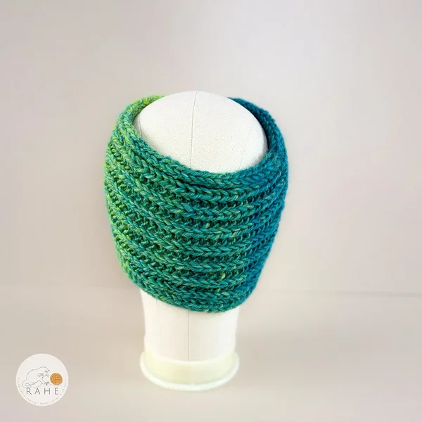Back view of a hand-knitted  gradient yellow and greenish blue  wool blendear warmers for girls and women.