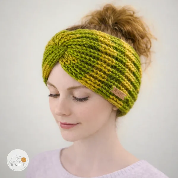 Hand-knitted wide wool blend headband worn by a female model, striped mustard yellow and light olive green, twisted design, soft and stretchy knit, RAHEcraft