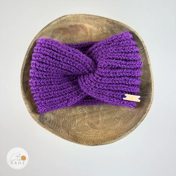 Hand-knitted wide wool blend headband flat lay with twisted center, purple color, RAHEcraft