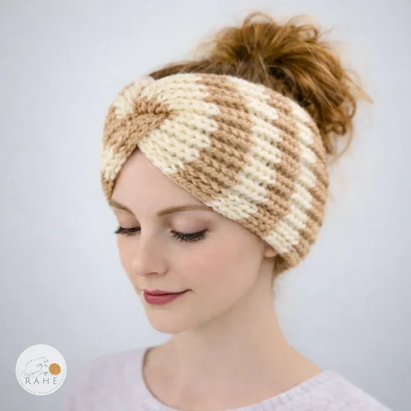 Hand-knitted wide wool blend headband worn by a female model, striped beige and ivory white, twisted design, soft and stretchy knit, RAHEcraft
