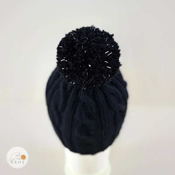 Black merino wool hat for boys and girls. Hand-knitted soft and stretchy reflective pom pom winter beanie.  Handmade in Estonia.