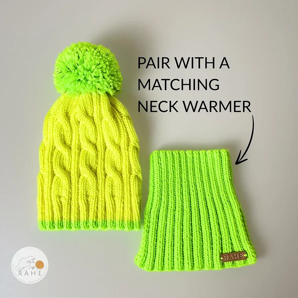 Hand-knitted neon yellow merino wool kids hat with reflective pom-pom and matching neck warmer. Handmade in Estonia – soft, warm, and perfect as a winter gift set.