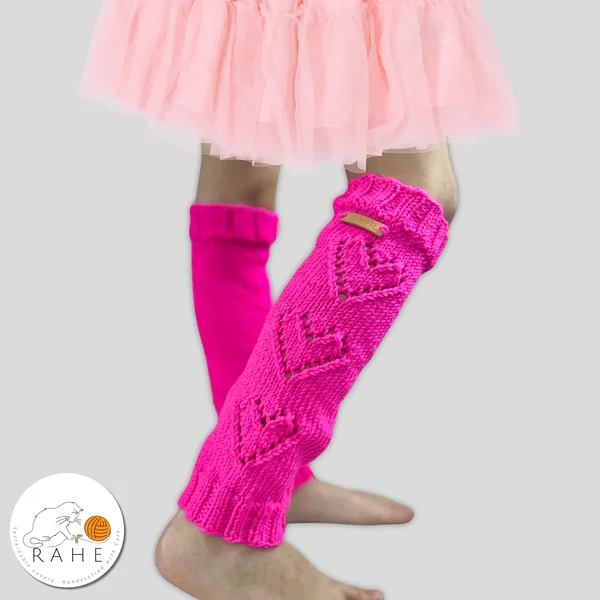 neon pink leg warmers for kids. Hand-knitted merino wool kids' leg warmers with three lacy hearts. Handmade in Estonia. 