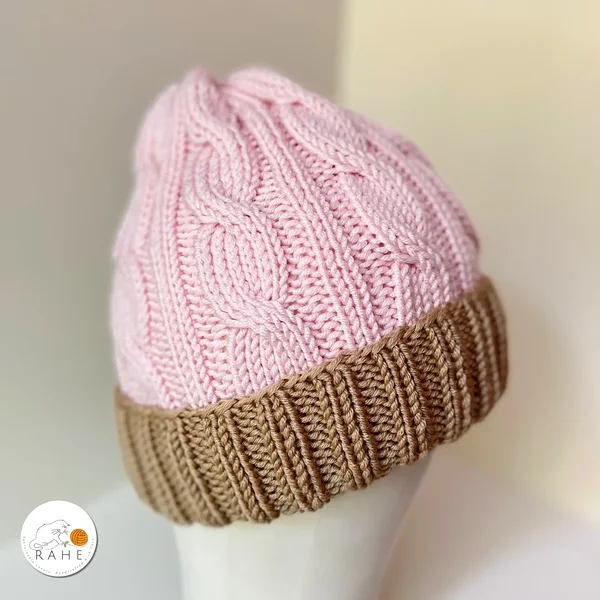Merino wool hats for women. Hand-knitted wool beanie in pink and beige.