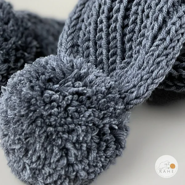 Grey merino wool knitted scarf with reflective bobbles. Handmade in Estonia.