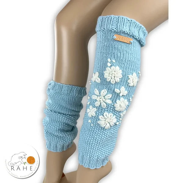 Romantic hand-knitted leg warmers in light blue merino wool – hand-embroidered with white flowers, elegant Estonian handmade gift idea.