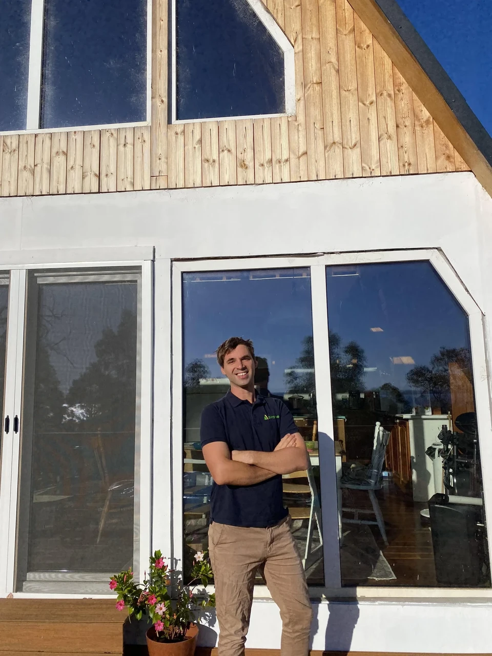 Chris outside his Avrame home