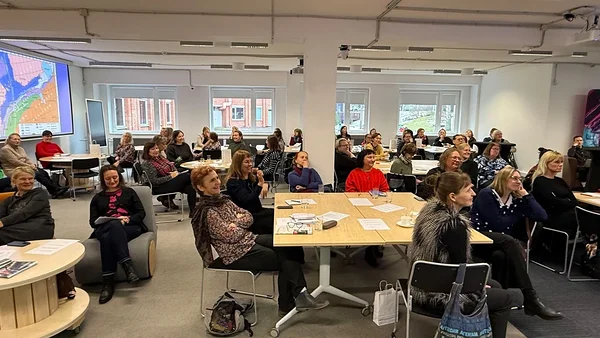 Teachers attending a lecture during the training day at Mektory