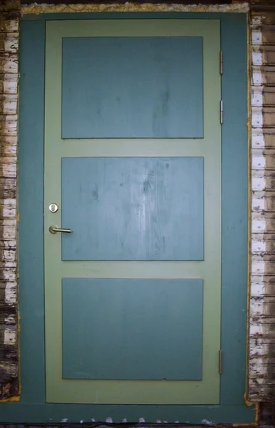 Manteltahvlitega uks