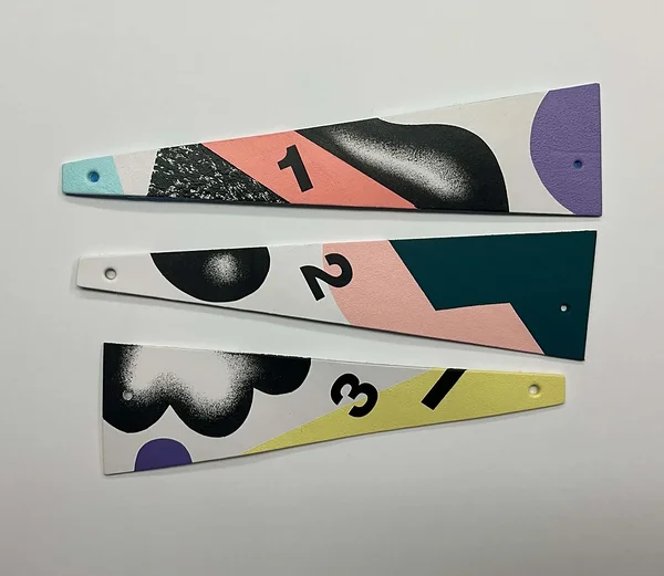Leather pieces painted by Anu Samarüütel, numbered 1, 2 and 3
