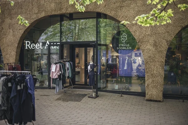 Front door of Stella Soomlais's shop in Telliskivi — reed walls in front of the glass façades